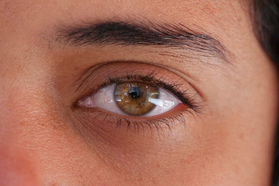 Before and after transformation showing dramatic eyelash extension results